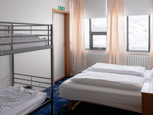 Quadruple room with shared bath and access to kitchen room